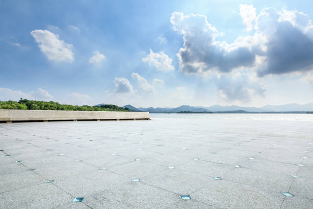 istock Square floor and mountain with lake on a sunny day 1018527544