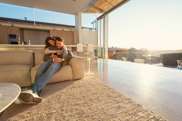 istock Couple on the sofa at sunrise. 1018528524