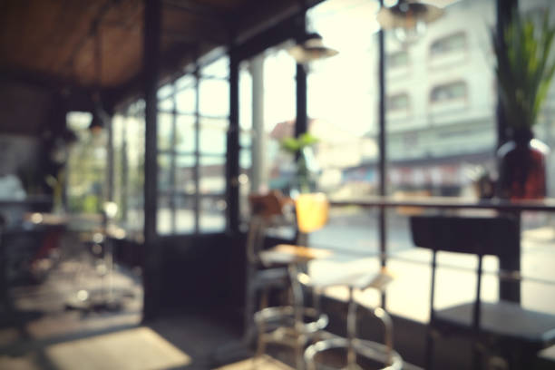 Blur coffee shop - cafe blurred with bokeh background, vintage style stock photo
