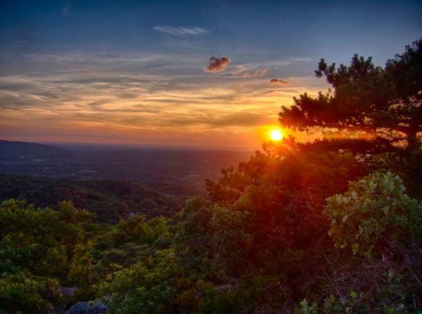 Sunset Over Storm King Storm King Mountain orange county new york stock pictures, royalty-free photos & images