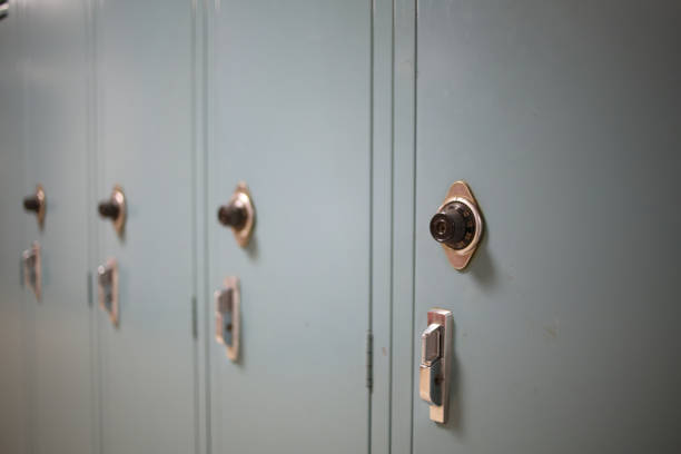 istock Back to School Concept - Light Blue Gray Student Lockers at a High School or College 1018560350