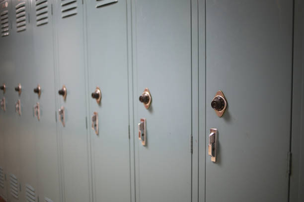 istock Back to School Concept - Light Blue Gray Student Lockers at a High School or College 1018560370