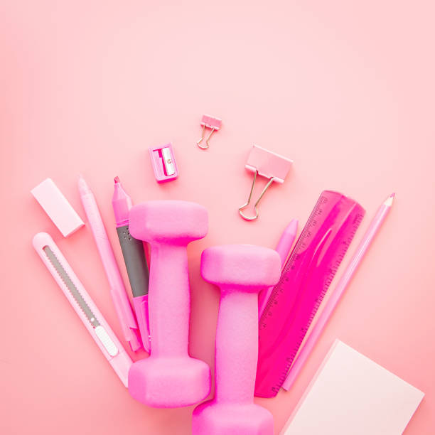 istock pink stationery on pink background with copy space flat lay top view 1018583828
