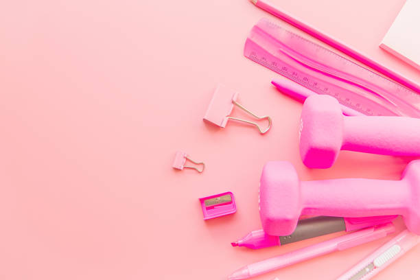 istock pink stationery on pink background with copy space flat lay top view 1018583918