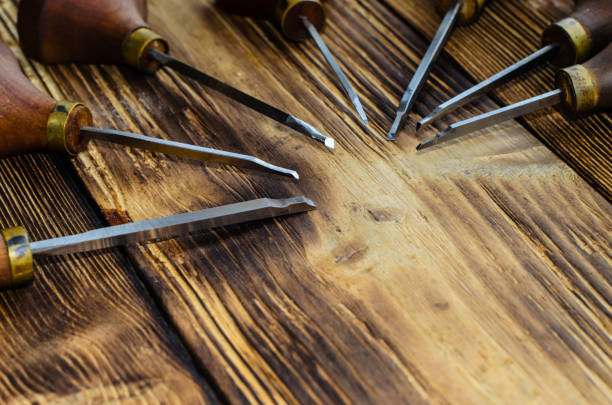 istock Different gravers for jewelry on wooden background 1018583986