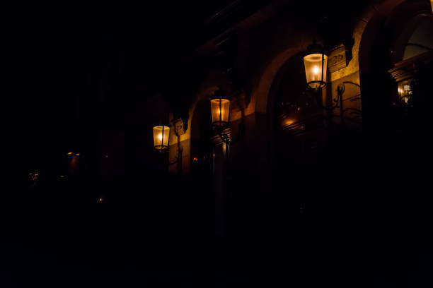 istock Old lanterns on a wall of the house 1018586384