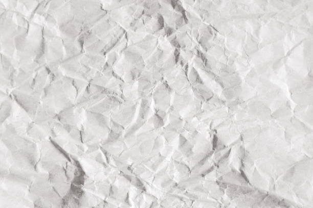 istock Background of old crumpled craft package wrapping paper texture 1018615754