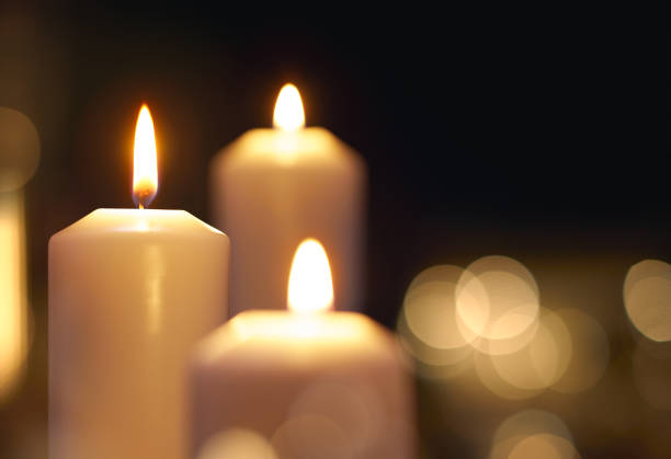 istock Candles light with shallow depth of field 1018631844