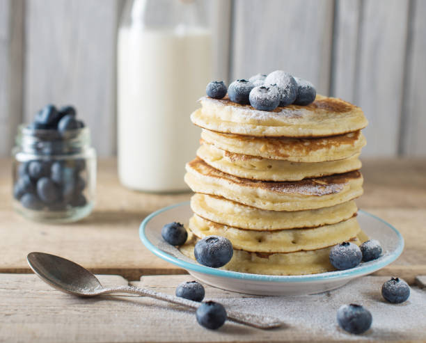 istock Some pancakes with blueberry on the wood table 1018651772