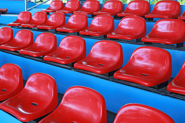 istock Red seats on the row at the stand. 1018652450