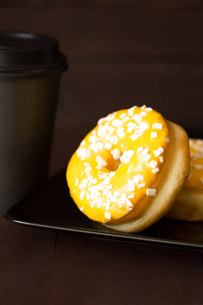 istock Paper cup coffee to go. Sweet donut with caramel icing. 1018659606