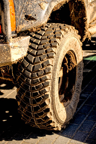 istock tyre off an off road car with mud 1018663018