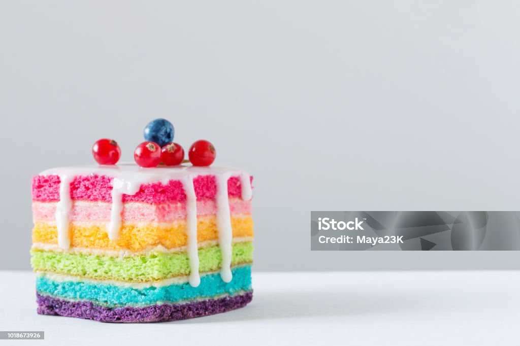 rainbow cake on white background Cake Stock Photo