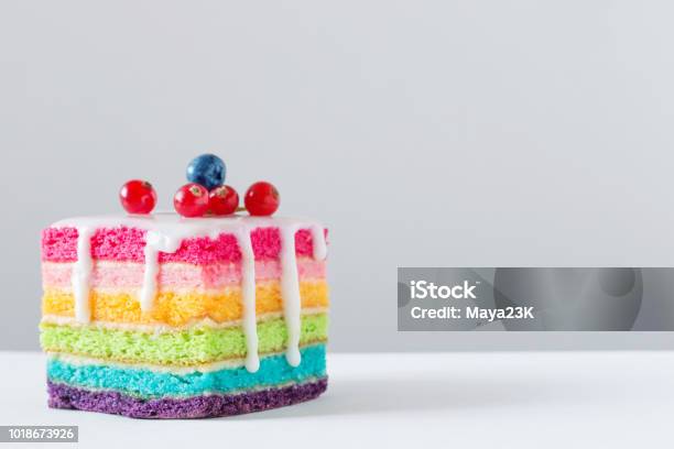 Rainbow Cake On White Background Stock Photo - Download Image Now - Cake, Dessert - Sweet Food, Slice of Cake