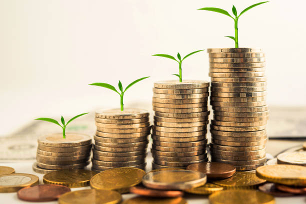 istock step of golden coins stacks on table with tree growing on top 1018674294