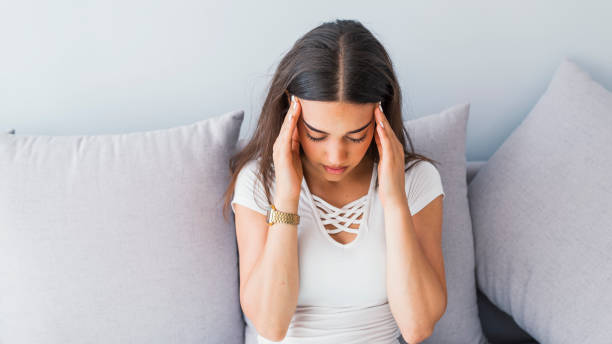 istock Tender woman has high blood pressure. 1018702986