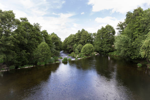 istock water running slow and calm down a river 1018703962