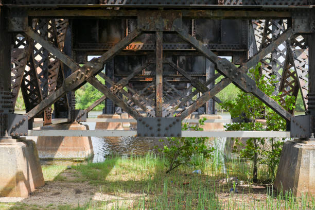 istock Old rusty parts on the bridge 1018707390