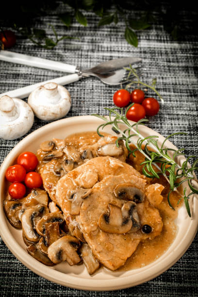 istock Braised pork chop with mushrooms. 1018707714
