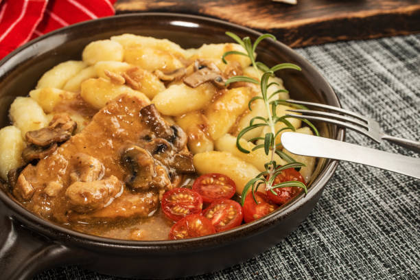 istock Braised pork chop with mushrooms. 1018710058