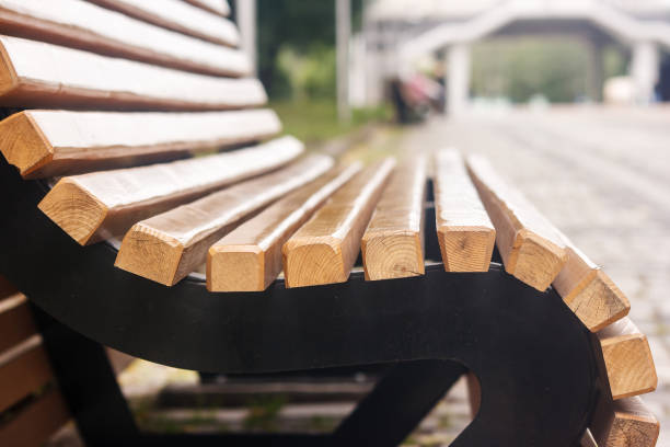 istock garden bench in the city park 1018727364