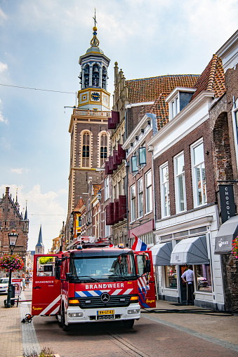 Fire engine of the Dutch fire department at a fire on a balcony in the inner city of the town of Kampen in Overijssel, The Netherlands. The fire was quickly put out.