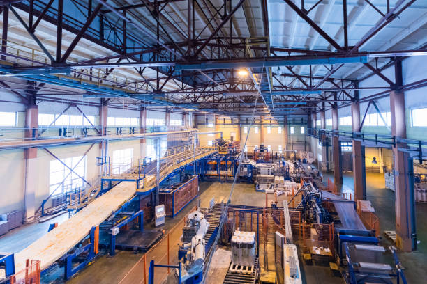 istock Factory workshop interior and machines on glass production background 1018731472