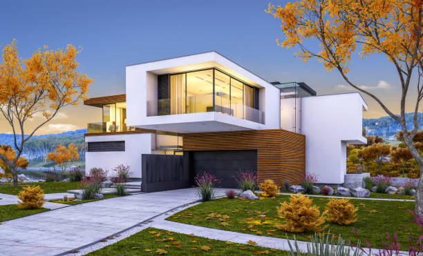 istock 3d rendering of modern cozy house by the river. Cool autumn evening with soft light. 1018731596
