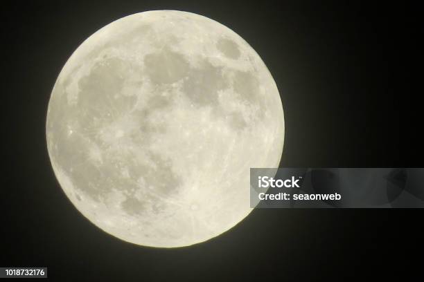 A Closeup Of A Full Moon Showing Craters Stock Photo - Download Image Now - Full Moon, Moon, Bright