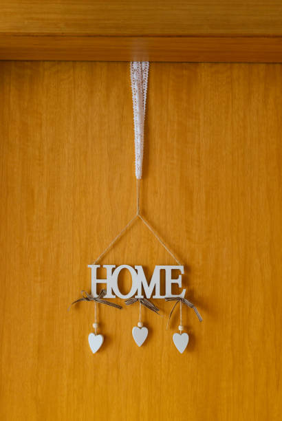 istock Decorative home letter on an entrance door 1018738392