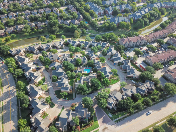 istock Top view apartment complex building with swimming pool near canal 1018742536