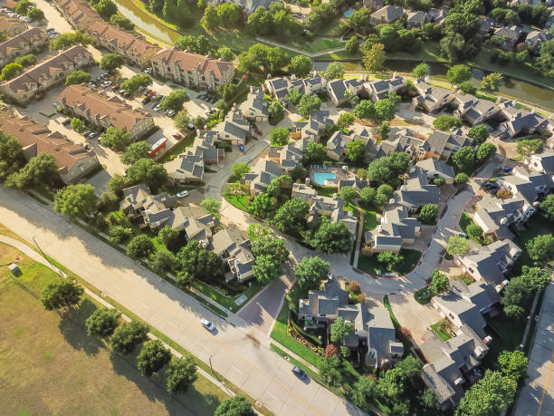 istock Top view apartment complex building with swimming pool near canal 1018742564