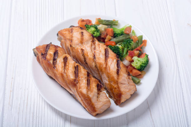 istock Grilled salmon fish with vegetables 1018746066
