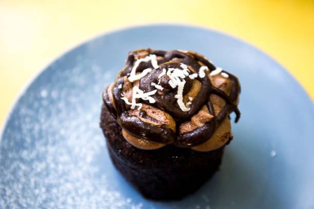 istock Chocolate muffin on the blue plate 1018747216