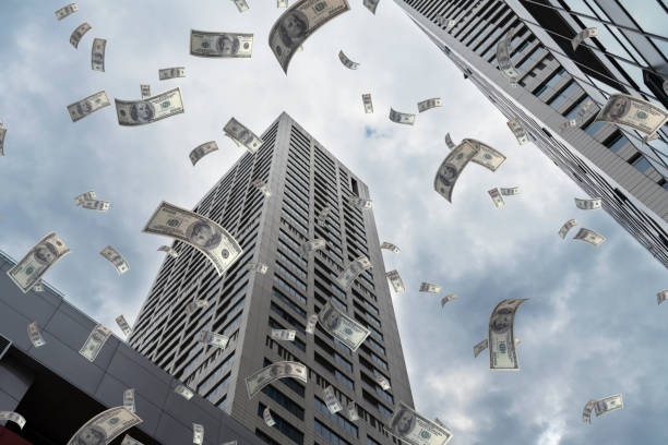 istock Dollar Flying in City 1018751554