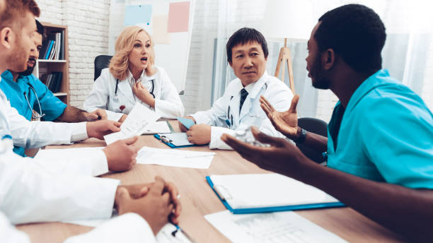 Multinational Doctors Group Diagnostic Meeting. stock photo