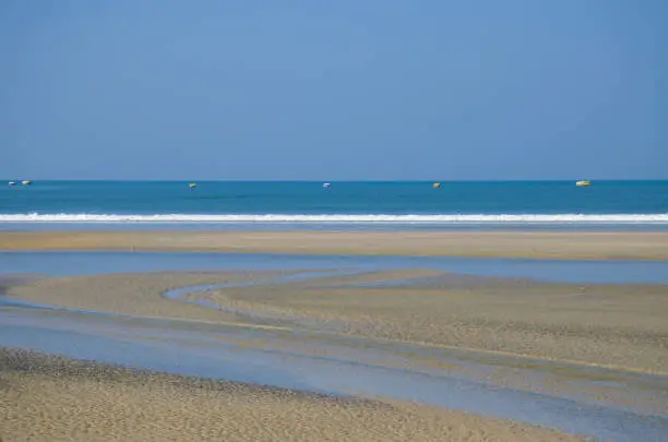 landscape the Arabian blue Sea with white sand in Goa India