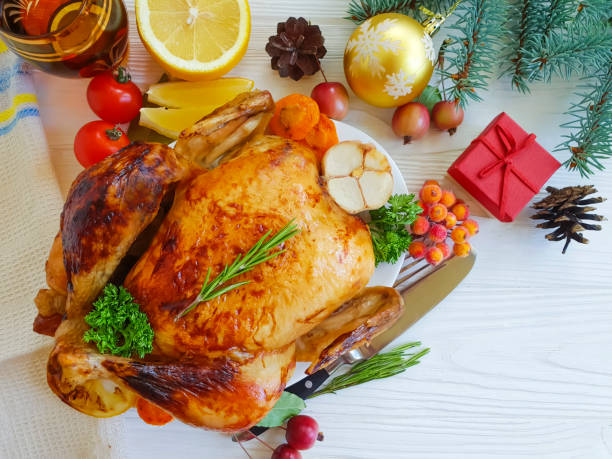 istock chicken fried whole christmas white on a wooden background 1018757954