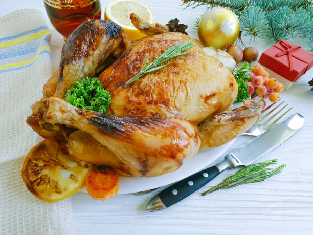 istock chicken fried whole christmas white on a wooden background 1018760536