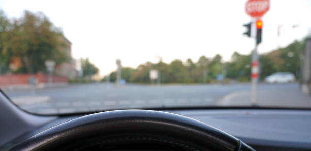 istock steering wheel road junction traffic light 1018764328