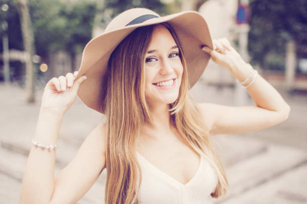 istock Positive Young Beautiful Woman Outdoors in Summer 1018764366
