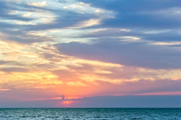 istock Scenic sunset over the blue sea 1018767262