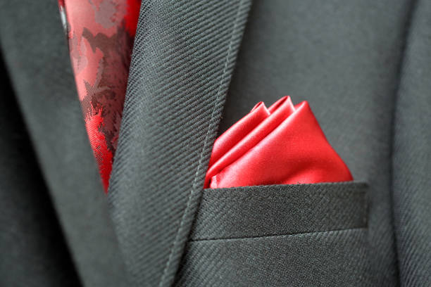 istock groom red boutonniere before the wedding ceremony 1018779456