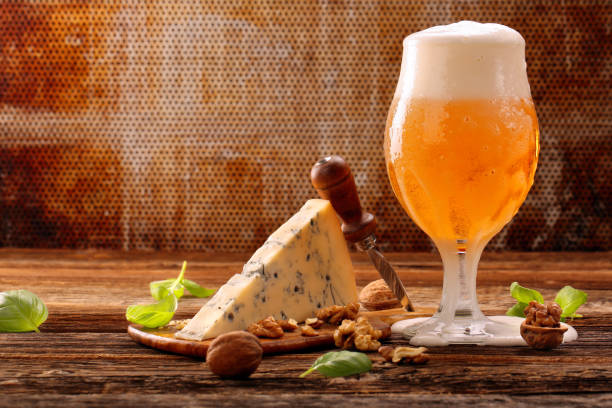 istock Blue cheese appetizer and beer on brown vintage background 1018789274