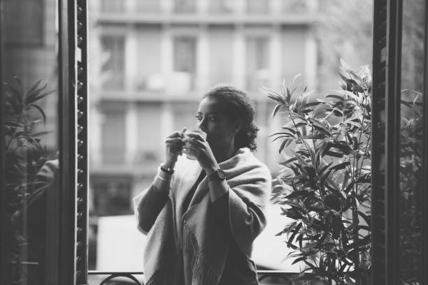 Young stylish woman in Paris, black and white