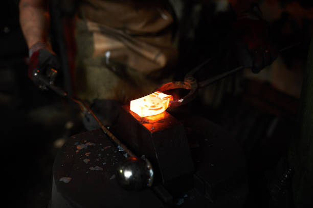 istock Small heated detail on anvil 1018801132