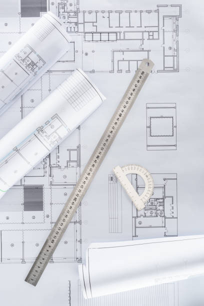 istock top view of architect blueprints with ruler and protractor 1018805270
