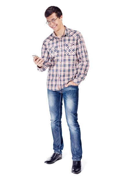 istock Man texting on phone full body 1018805326