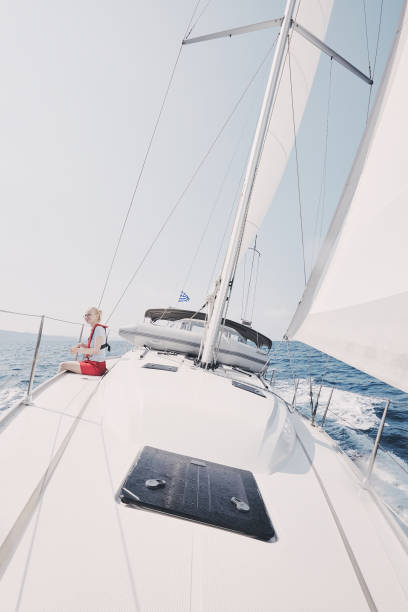 istock Woman on yacht 1018810598