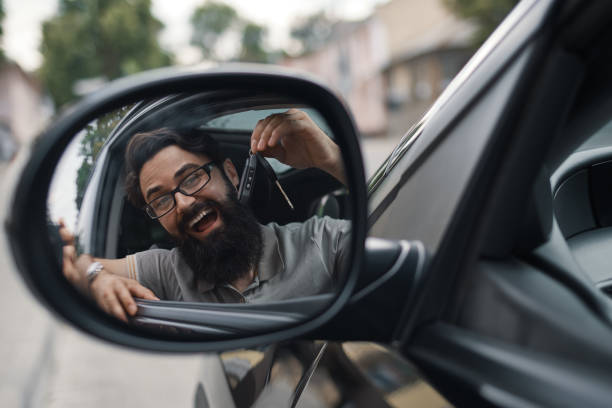 istock Charismatic man holding car keys 1018811552